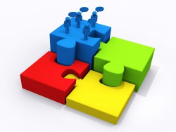 business teamwork on puzzle pieces to success